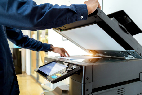 Image of a man scanning paper